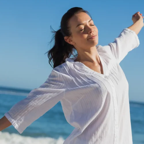 A Woman practicing streching an effective ways to release stress.